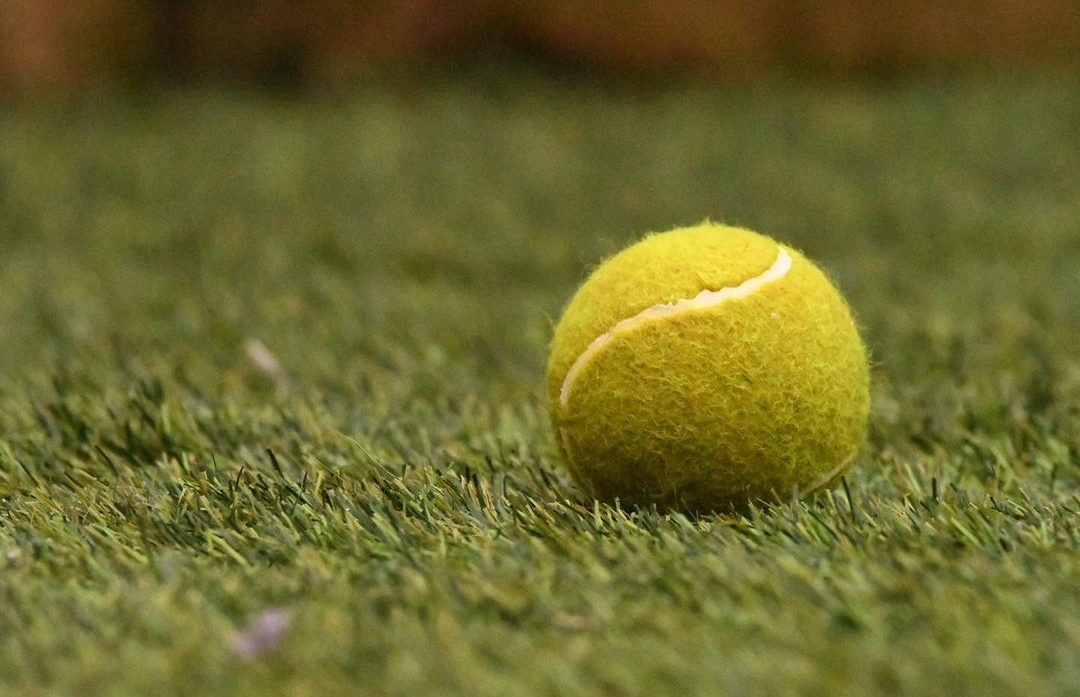 Why Do Tennis Players Bounce the Ball Before Serving? Explained